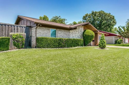 1803 Redbud Cir, Carrollton TX  75006-4200 exterior