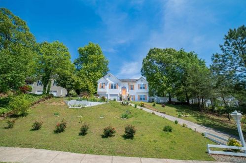 1034 Whispering Woods Dr, Holly Springs, GA 30114-2271