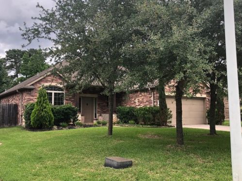 1946 Honey Laurel Dr, Conroe TX  77304-2156 exterior