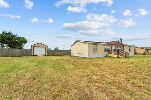 1406 Grand Prix Ct, Rhome, TX 76078-4834