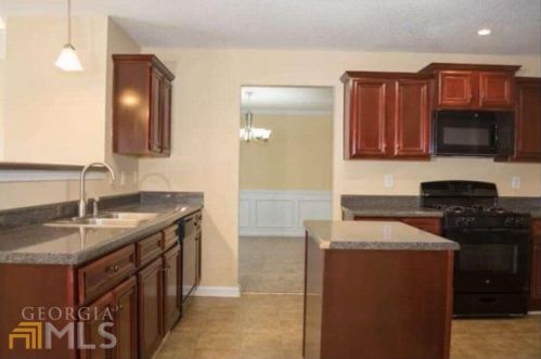1897 Sawgrass Dr, Hampton GA  30228-5314 exterior
