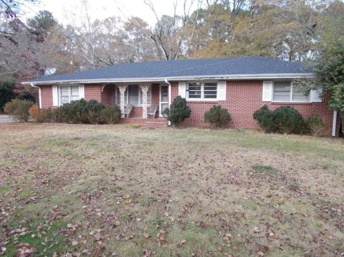 2048 Pucketts Dr, Lilburn, GA 30047-5623