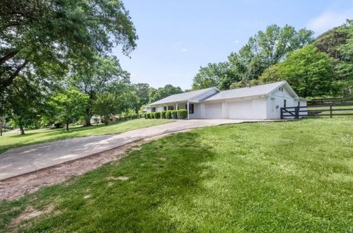 905 Ranch Dr, Holly Springs, GA 30114-2135
