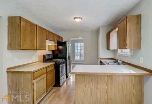 715 Durham Ridge Ct, Lilburn, GA 30047-5875