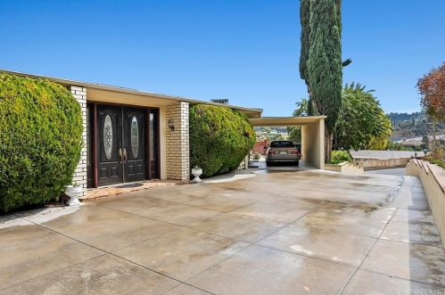 15641 High Knoll Rd, Van Nuys, CA 91436-3420