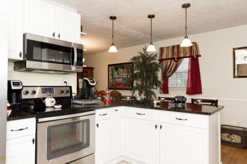 6114 Cherry Valley Dr, Porterdale, GA 30014-3914