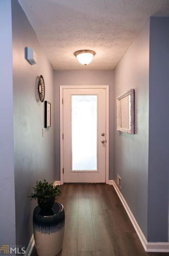 210 Branchwood Dr, Porterdale, GA 30016-4567