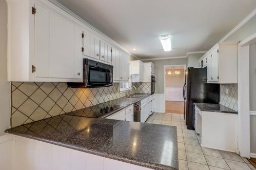 593 James St, Lilburn, GA 30047-3057