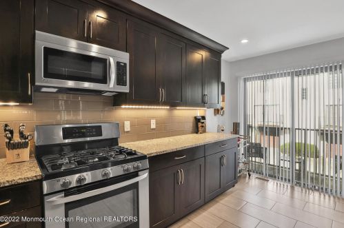 63 Tower Hl Dr, Tinton Falls NJ 07701-2473 exterior